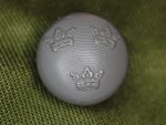 Knapp liten m/39 plast grå bottnad 15 mm till uniform m/39-58 bröstfickor vid brist på metallknappar