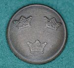 Knapp stor m/1865-1939 brons 21 mm med vikben införs på mössmärke (mössoval) m/39 Underofficer 
